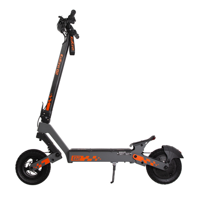 A KUKIRIN G2 electric scooter in gray with orange accents, featuring a front suspension system, large wheels, and a rear basket.